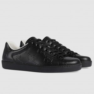 Gucci Men's Ace Sneakers in Black GG Embossed Leather